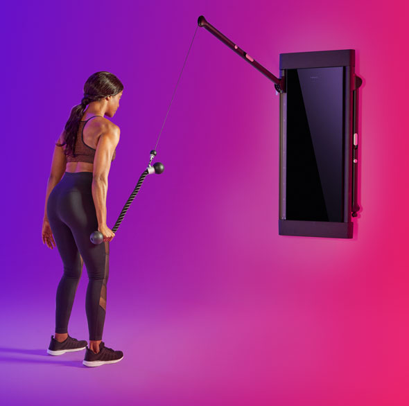 Person working out with a Tonal Resistance trainer