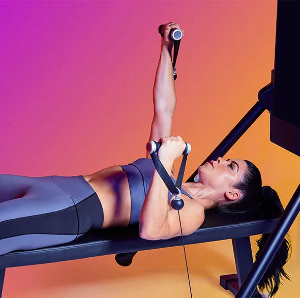 Person working out with a Tonal Resistance trainer