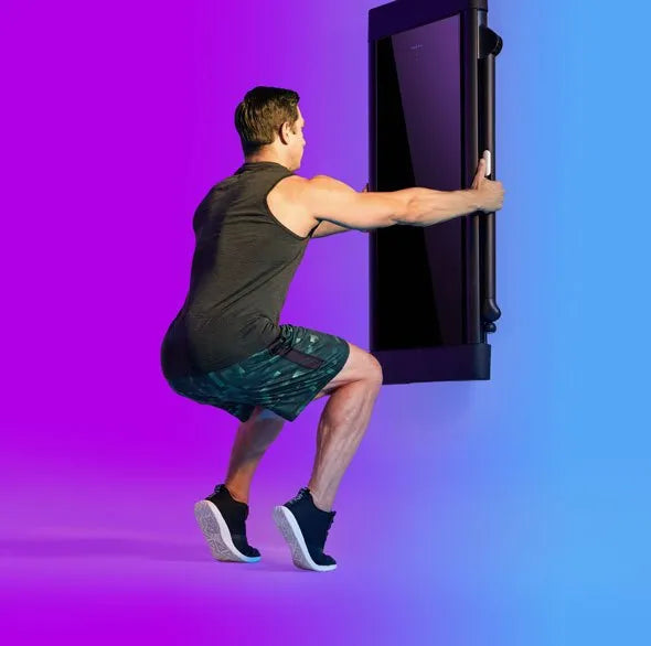 Person working out with a Tonal Resistance trainer