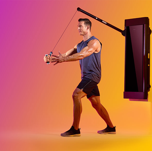 Person working out with a Tonal Resistance trainer