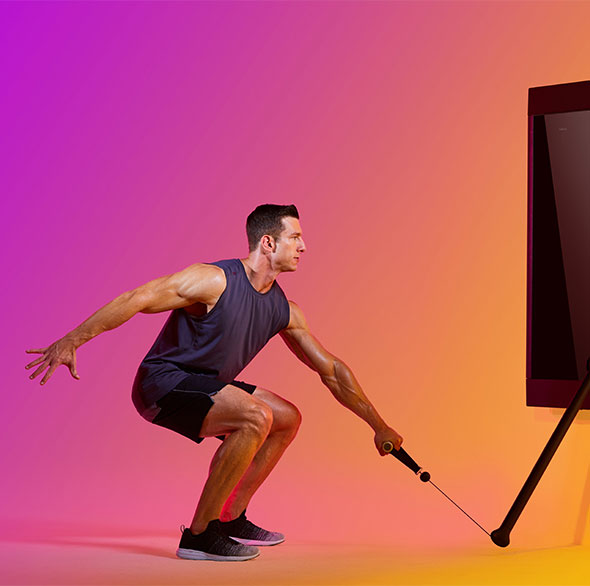 Person working out with a Tonal Resistance trainer