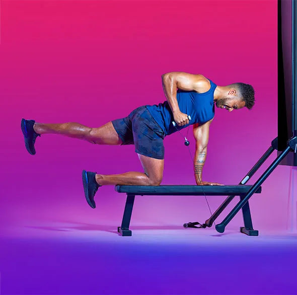 Person working out with a Tonal Resistance trainer