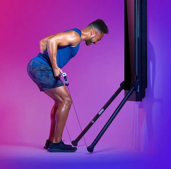 Person working out with a Tonal Resistance trainer
