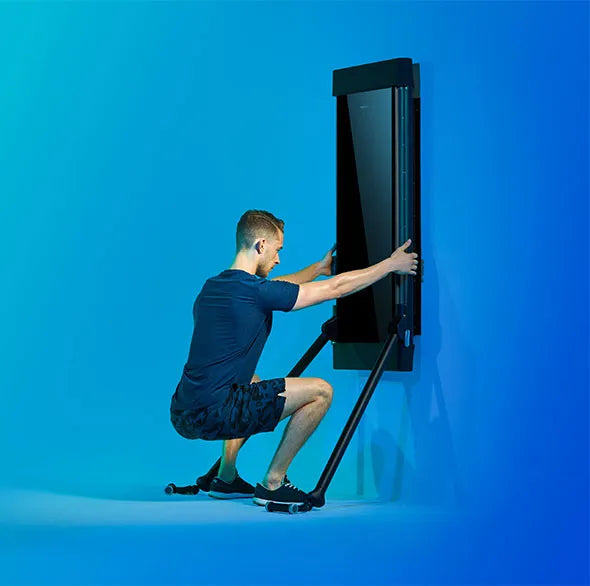 Person working out with a Tonal Resistance trainer