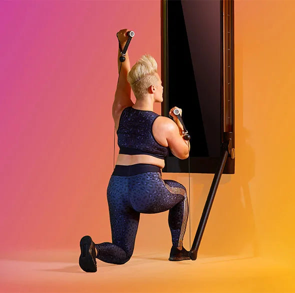 Person working out with a Tonal Resistance trainer