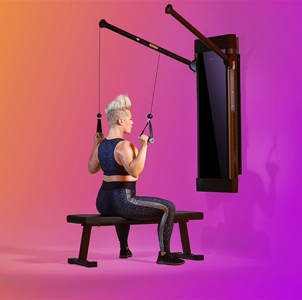 Person working out with a Tonal Resistance trainer