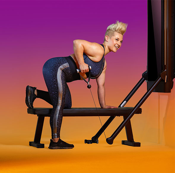 Person working out with a Tonal Resistance trainer