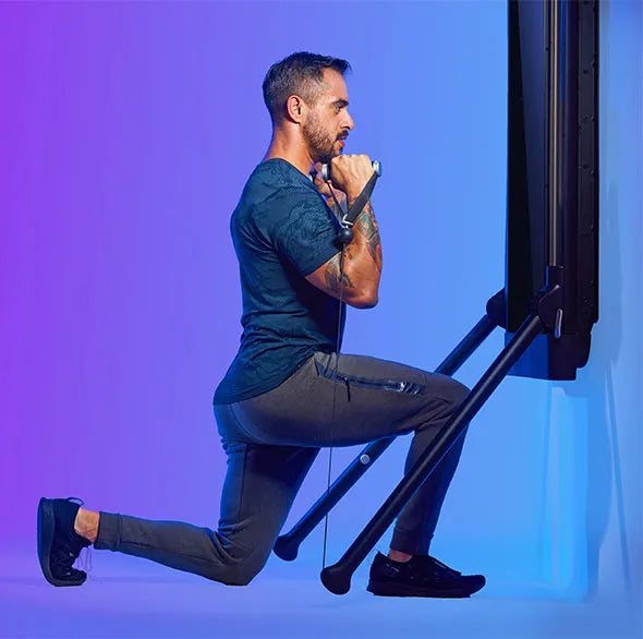 Person working out with a Tonal Resistance trainer
