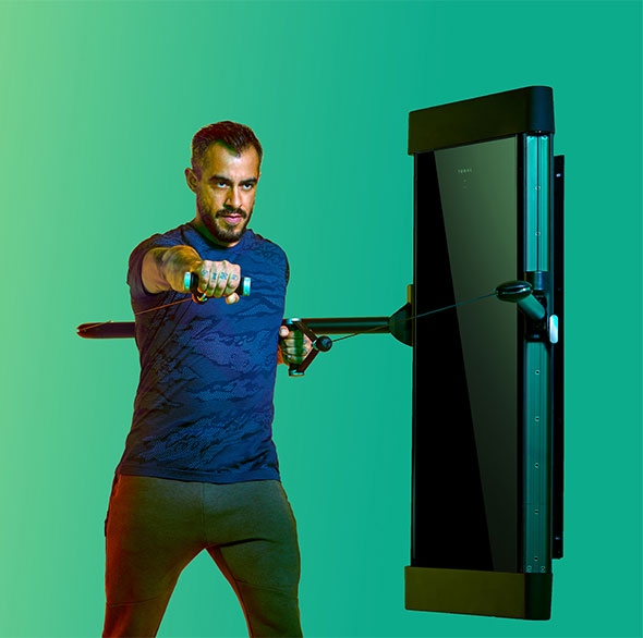 Person working out with a Tonal Resistance trainer