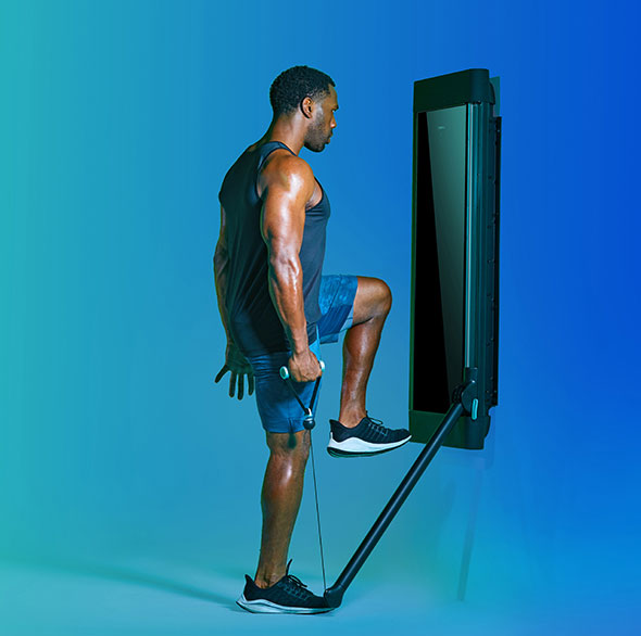 Person working out with a Tonal Resistance trainer