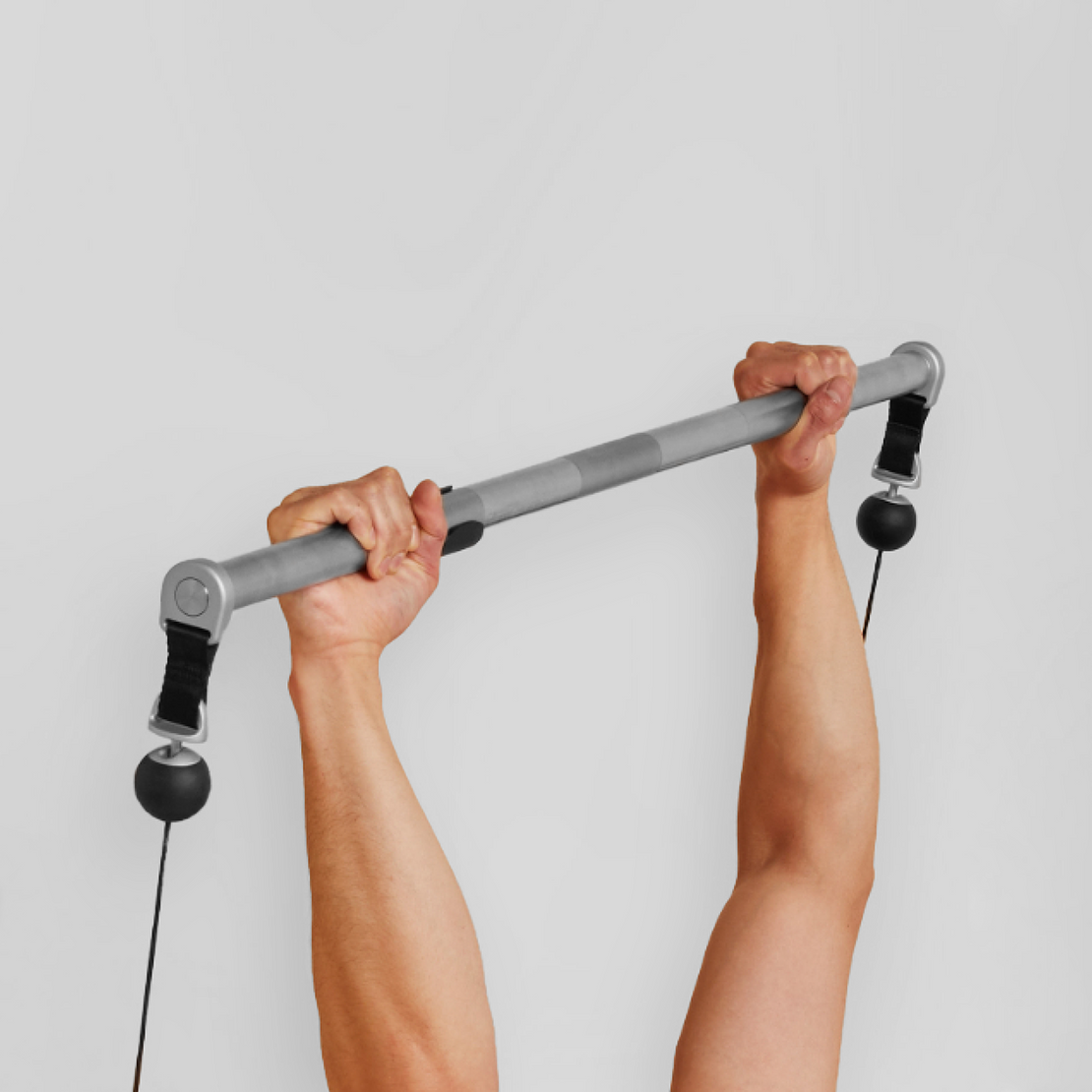 Person using Tonal Bar with Tonal machine