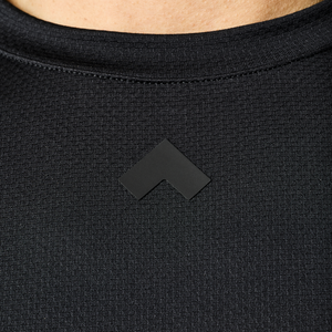 Close up of collar of black Men's Tonal Performance shop long sleeve shirt