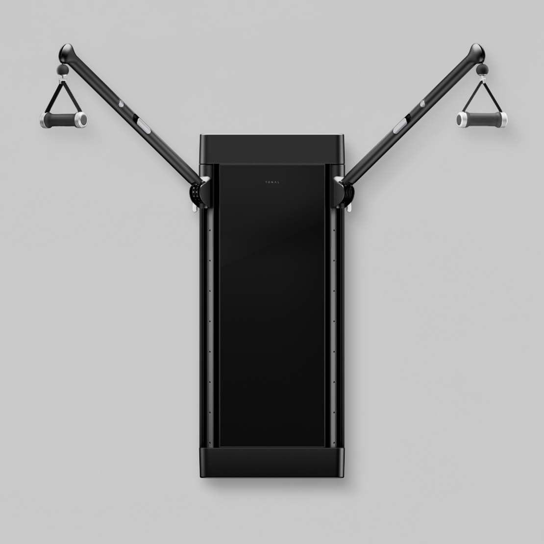 Certified Refurbished Tonal device mounted on a white wall.